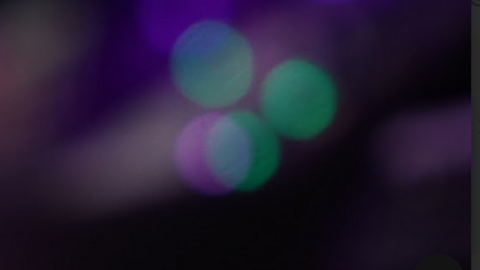 abstract modern color field of green circles over purple - photo Casey Smerczynski