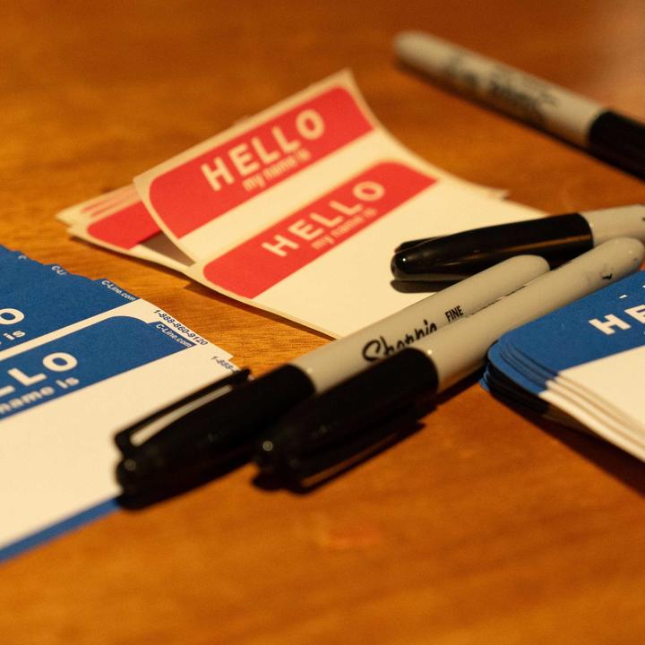 Blue and red blank name tag labels and markers